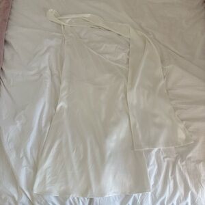 White mini dress with neck scarf